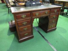 Mahogany knee-hole desk with leather inset, 122cms x 76cms x 56cms. Estimate £20-40.