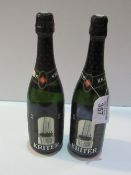 2 bottles of vintage 1980's Kriter Estra Leger Vin Mousseux, Black Top. Estimate £20-30.