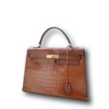 * Hermes Kelly Havana Porosus crocodile handbag, original key/padlock