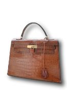 * Hermes Kelly Havana Porosus crocodile handbag, original key/padlock