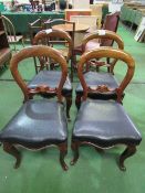 4 Victorian mahogany balloon back leather seat dining chairs on cabriole legs. Estimate £60-80.