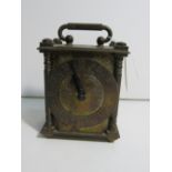 Smiths engraved brass clock with self start movement and Roman numerals 11cm high. Estimate £20-40.