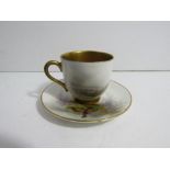 Royal Worcester porcelain coffee cup and saucer decorated with pheasants, with heavily gilded