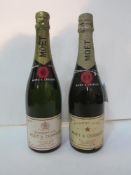 2 bottles of vintage 1980's Moet & Chandon Premiere Cuvee, White label. Estimate £30-40.