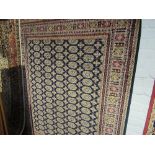 Blue ground Bokhara carpet, 2.3 x 1.60. Estimate £60-70.