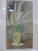 Framed & glazed painting signed G A Moore, 1945 of still life vase of Lupins. Estimate £10-20.