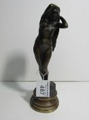 Early 20th century solid bronze nude female on marbled base, signed. Estimate £60-80.