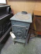 A JØtul 602 wood-burning stove. Estimate £100-150.