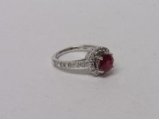 18ct white gold, ruby & diamond ring, wt 5.5gms, size K 1/2. Estimate £560-600.