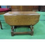 Small oak drop-leaf table, height 45cms. Estimate £5-10.