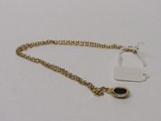 9ct gold chain & 9ct gold pendant, total wt 7gms. Estimate £50-60.