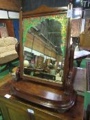 Large late Victorian dressing table mirror with scrolled arms supporting a large bevelled plate