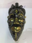 Unusual Ashanti brass inlaid African male tribal mask by the Akan people. Estimate £20-30.