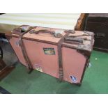 Large 1930's travel trunk with leather straps & various hotel stickers. Estimate £10-30.