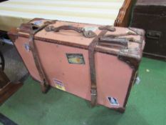 Large 1930's travel trunk with leather straps & various hotel stickers. Estimate £10-30.