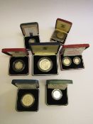 7 Royal Mint UK silver proof & BU coins/coin sets 1986 - 1992 with certificates. Estimate £70-100.