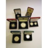 7 Royal Mint UK silver proof & BU coins/coin sets 1986 - 1992 with certificates. Estimate £70-100.