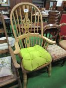 High back Windsor armchair. Estimate £40-60.