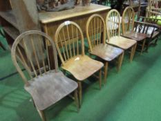 5 Ercol Windsor chairs with shaped seats. Estimate £100-120.