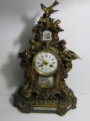 Ornate mantel clock with enamelled panel by Jules Bariquand, Paris