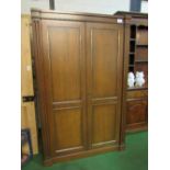 Stag mahogany double wardrobe with brass detail, 122cms x 194cms x 58cms. Estimate £30-50.