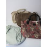 4 Radley handbags with dust covers. Estimate £40-60.