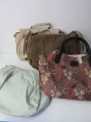 4 Radley handbags with dust covers. Estimate £40-60.