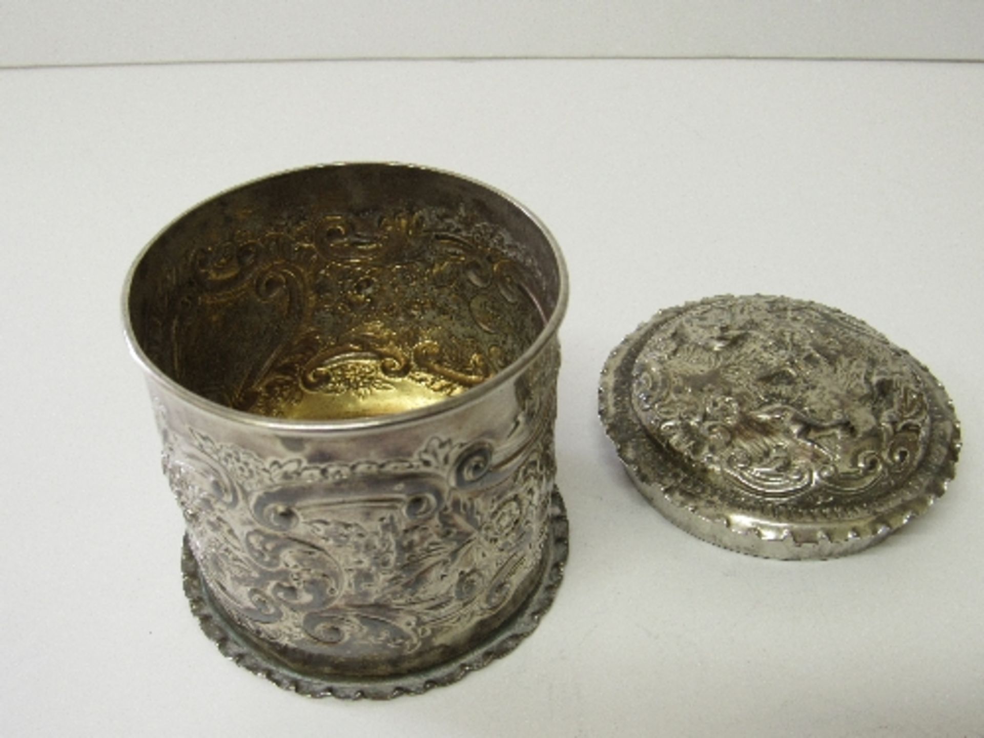 Repousee decorated silver lidded pot, Birmingham 1890, 3.38ozt. Estimate £30-50. - Image 2 of 2