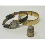 Silver thimble, fashion wrist watch & a bangle. Estimate £10-20.