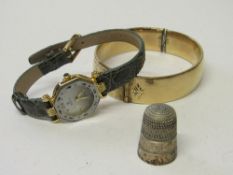 Silver thimble, fashion wrist watch & a bangle. Estimate £10-20.