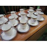 12 Paragon 'Sandringham' coffee cups & saucers, a milk jug & a Staffordshire china tea set for