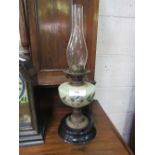 Oil table lamp complete with chimney, height 55cms. Estimate £20-30.