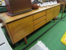 A long teak sideboard by White & Newton Ltd of Portsmouth, 208cms x 46cms x 72cms. Estimate £100-