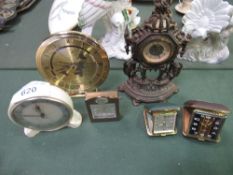 2 vintage brass clocks, 2 travel clocks, World clock & a Smith's clock. Estimate £25-35.