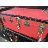 Red coloured travel trunk. Estimate £10-20.