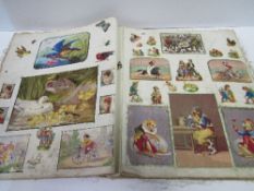 A Victorian scrap book. Estimate £5-10.