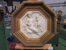 Marble relief picture in octagonal gilt wooden frame, 67cms x 67cms. Estimate £60-80.