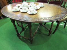 Oak drop-leaf gate leg table with barley twist legs & stretchers & carved edges. Estimate £80-100