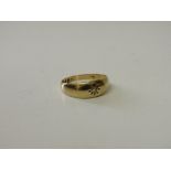 18ct gold and solitaire diamond band Size 0 wt 3.0g. Estimate £50-70