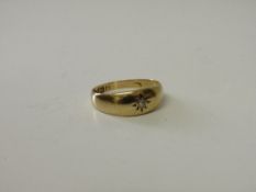 18ct gold and solitaire diamond band Size 0 wt 3.0g. Estimate £50-70