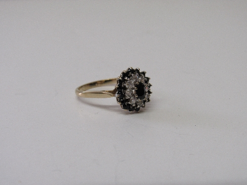 9ct gold sapphire and CZ stone ring size P wt 2.7g. Estimate £35-50