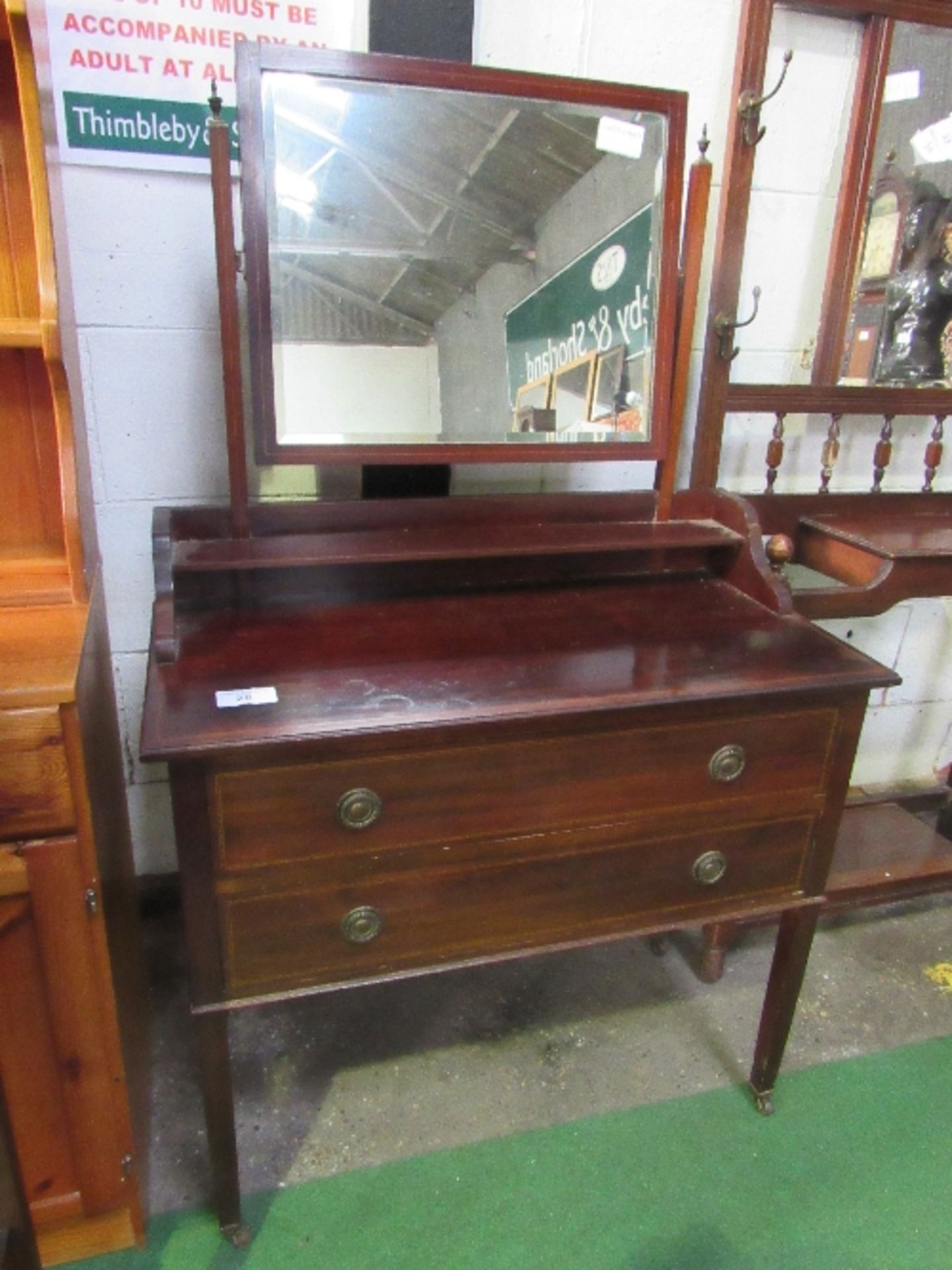 Mahogany dressing chest, 91cms x 46cms x 149cms. Estimate £10-20.