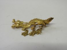 Chinese gold brooch, believed to date mid 19th century, in the form of a dragon