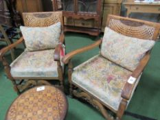 2 bergere-back armchairs with floral upholstered seats & carved front stretcher. Estimate £80-100.