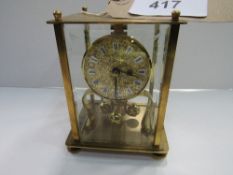 1970's West German made anniversary clock (going order) but without a key. Estimate £20-40.