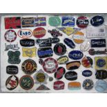 Box of motorcycle badges. Estimate £5-10.