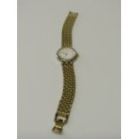Seiko lady's wrist watch with yellow metal bracelet (not going). Estimate £10-15.