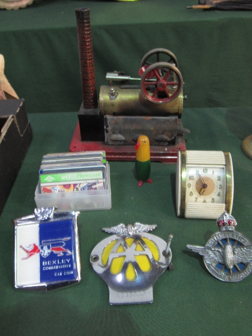 3 car badges, AA, CSMA & another; vintage travelling alarm clock by West Clox & a Fleischmann