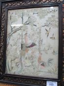 Silk embroidered scene of exotic birds in a glazed & open fretted frame. Estimate £20-30.