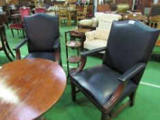 2 Gainsborough style armchairs in dark blue leather. Estimate £80-120.